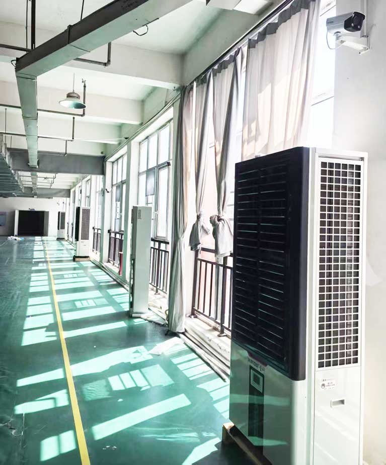 大型制衣廠制冷降溫，應(yīng)用工業(yè)省電空調(diào)-立式軸流雙風(fēng)口機(jī)組